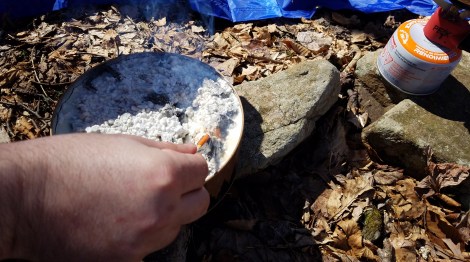 Radiate Portable Campfire review lighting the campfire 1. The match did not initially light the Radiate Portable Campfire due to the wind.