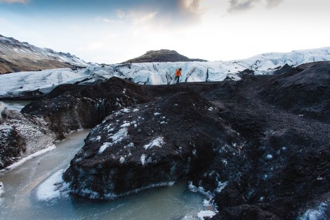 Climate Change is Affecting the Global Landscape of Mountains. Climber climbing on melting glacier. Climber climbing on melting glacier.