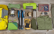 Gifts for outdoor enthusiasts Base Camp Magazine. A photo of outdoor gear spread out on the floor.